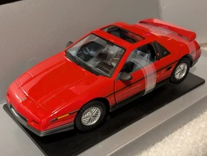 IMPRESIONANTE YAT MING / FIRMA DE CARRETERA - 1985 PONTIAC FIERO GT V-6 (ROJO) 1/18 DIECAST - Imagen 1 de 24