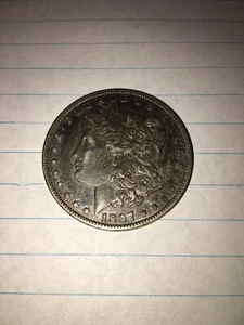 1897-0 Morgan Silver Dollar - Picture 1 of 4