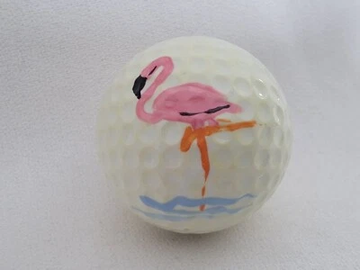 Pelota de golf rosa con logotipo de flamenco Foto 1 de 2