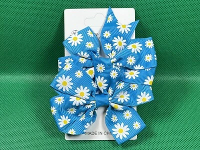 Juego de pasadores de pelo de cinta de grosgrain de cinta de cabello de margarita azul colorido Foto 1 de 4