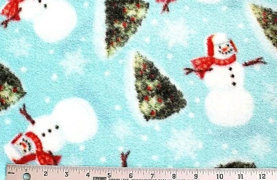 BTY*CHRISTMAS SNOWMEN TREES SNOWFLAKES SNOWBALLS ON BLUE FLEECE FABRIC 60X36" - Image 1 of 4