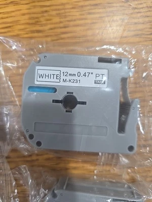 Cinta de etiquetas de repuesto Brother Label Maker, paquete de 18, 12 mm x 0,47 pulgadas Foto 1 de 4