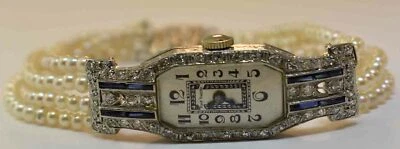 RELOJ CÓCTEL VINTAGE PLATINO-DIAMANTE (.54ct) ZAFIRO (.30Ct) PERLA (2.25MM) Foto 1 de 4