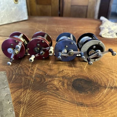 Vintage Fishing Lot / 4 Reels Langley - Different Colors & Models - Image 1 of 4