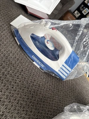 Plancha de vapor inalámbrica Oreck JP8100CB y base nueva, sin usar en caja original Foto 1 de 4