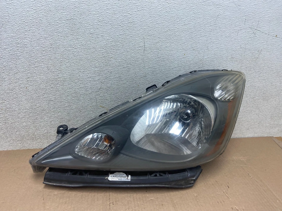 Faro lateral izquierdo halógeno OEM R1415 DG Honda Fit 2009 a 2013 conductor izquierdo Foto 1 de 4