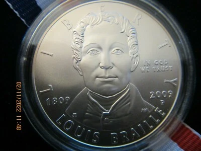 $ 2009 P United States Louis Braille Bicentennial Uncirculated Silver Dollar  - Image 1 of 3