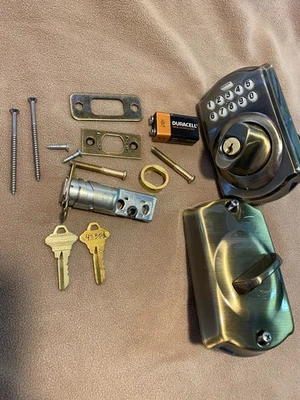 Schlage BE365 CAM 609 Camelot Electronic Keyless Deadbolt Antique Brass 2 Keys - Image 1 of 4