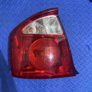 Kia Spectra sedan Drivers Side Tail Light 2004-2006 - Picture 1 of 2