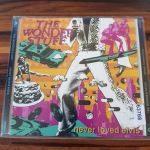 THE WONDER STUFF: Never Loved Elvis    > VG+/VG+(CD) - Bild 1 von 2