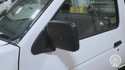Espejo retrovisor manual izquierdo pick up Nissan D21 90-97 lado conductor (negro) Foto 1 de 2