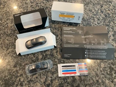 PORSCHE DESIGN OEM 911 AIR FRESHENER DIFFUSER W/URBAN ENERGY SCENT IN DK. GREY - Image 1 of 4