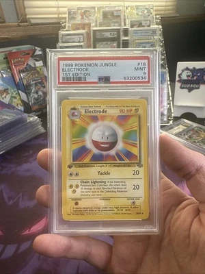 1st Edition MISPRINT ELECTRODE ERROR Non-Holo Rare 18/64 Jungle Set PSA 9 - Image 1 of 2
