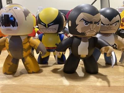 Mighty Muggs Marvel Lote de 4 Wolverine (x3) y Diente de Sable Foto 1 de 4