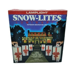 Lámpara de Navidad de colección Snow-Lite Luminarias 8 velas líquidas precargadas y bolsas - Imagen 1 de 5