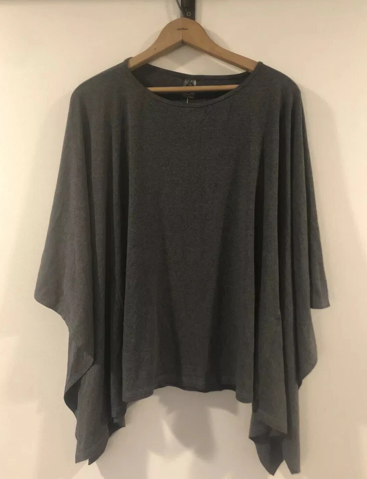 NUEVO CON ETIQUETAS LIQUIDO Mujer MEDIANO Yoga Gris Alas Salvajes Top Suelto Foto 1 de 3