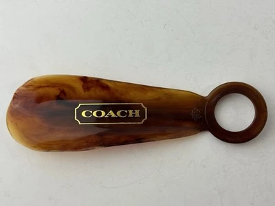 Zapato de plástico Coach Designer Logo carey marrón y dorado de 5" Foto 1 de 4