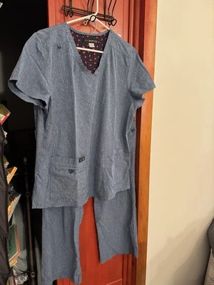 Women's Koi top and bottom uniform scrub set, denim blue, M pant, L top, both EU - Image 1 of 4