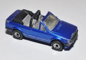 Matchbox Ford Escort Cabriolet XR3i Motor City MC-11 scala 1:56 blu 1991 - Foto 1 di 6