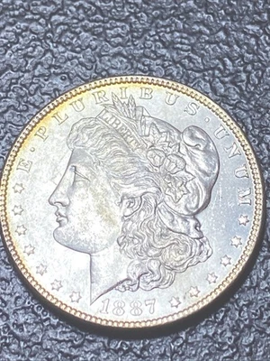 💎 1887 BU GEM MORGAN SILVER DOLLAR UNC MS+++ Gold Rim TONING - Image 1 of 4