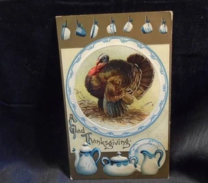 A Glad Thanksgiving Antique Postcard Ellen Clapsaddle Art Turkey & Dishes 1909 - Imagen 1 de 2