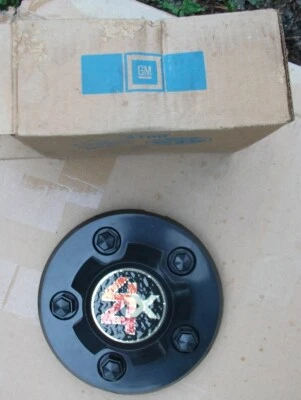 Pair GM OEM NOS 15592299 Steel Wheel Hub Center Cap 1983-1988 Chevrolet S10 4x4 - Image 1 of 3