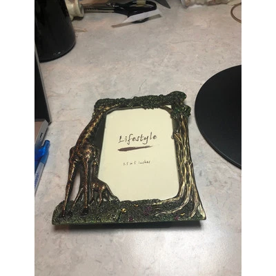 Marco jirafas comiendo del árbol metal dorado/bronce/verde  Foto 1 de 4