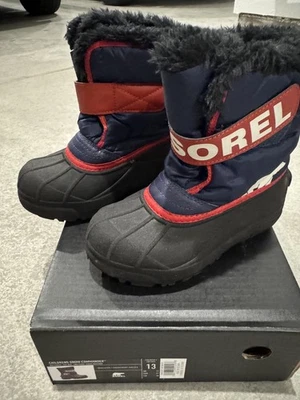 NUEVO EN CAJA SOREL Botas de Nieve Niños Estampado Flurry Bomb Azul/Rojo Talla 13 NUEVAS Foto 1 de 4