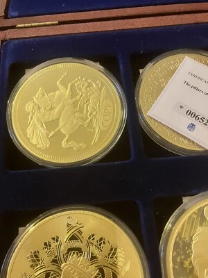 Set mit 6 vergoldeten Komomünzen im Etui mit Zertifikat für jede Münze - Bild 1 von 4