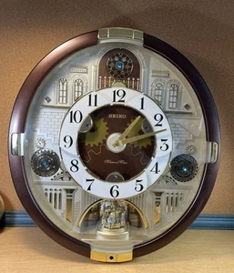 Seiko Melodies In Motion Musical Moving Wall Clock 20 Classic Melodies QXM377BRH - Picture 1 of 9