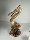 Vintage Pelican Bisque Figure On Rock Laughing 9? Tall Glossy Brown Prior Repair