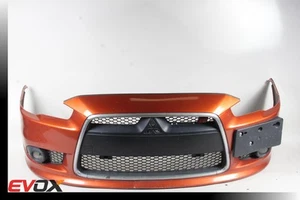 MITSUBISHI LANCER RALLIART 09-15 OEM FRONT BUMPER COVER PANEL W/ GRILL ORANGE - Picture 1 of 11