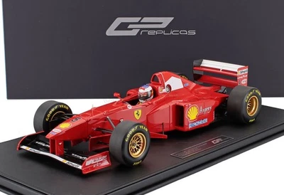 MODELLINO AUTO STATICO FERRARI F1 F310B FIGURE SCHUMACHER CANADA 1997 SCALA 1/12 - Immagine 1 di 4