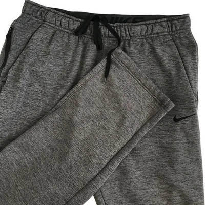 Pantalones deportivos Nike Therma-Fit para hombre grandes gris carbón gimnasio entrenamiento Foto 1 de 4