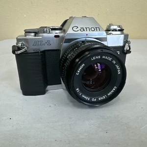 Cámara fotográfica Canon AL-1 SLR con lente Canon FD 50 mm 1:1,8 totalmente funcional probada - Imagen 1 de 9