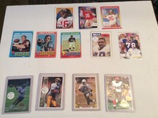 JOE MONTANA12 FOOTBALL CARDS BRUCE SMITH MARSHALL FAULK ISAAC BRUCE GARRISON HE