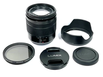 Panasonic Lumix G Vario 12-60mm f/3.5-5.6 Lens + Caps/Hood/Filter #2197 - Image 1 of 4