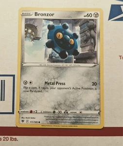 Bronzor (111/189) [Spada e Scudo: Radianza Astrale] Near Mint - Foto 1 di 1