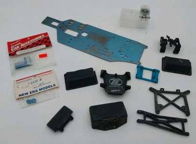 Losi Misc. RC Parts Lot XXXNT Fuel Tank Chassis Arms Mount 1/10 Nitro Truck  - Image 1 of 4