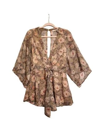 Exuberante mameluco floral talla mediana lazo cintura espalda abierta Foto 1 de 4