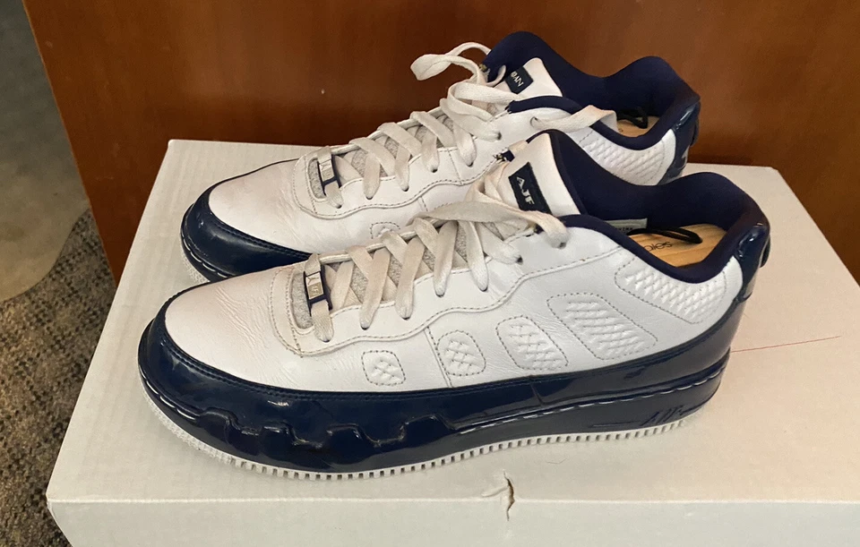 JORDAN FUSION AJF 9.5 BAJO BLANCO/METÁLICO-AZUL HOMBRE TALLA 9.5 (362279-141) Foto 1 de 4