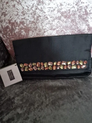 Bolso clutch Vera Wang con joyas Foto 1 de 4