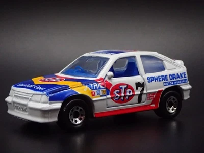 OPEL KADETT GSI VAUXHALL ASTRA GTE RACING ESCALA 1:64 DIORAMA COCHE MODELO DIECAST Foto 1 de 4
