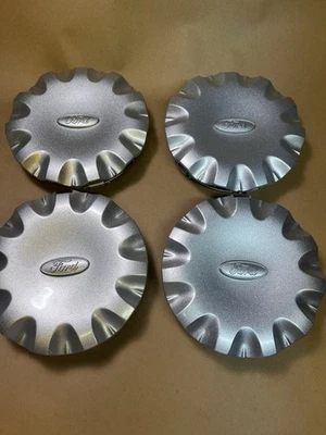 Juego de 4 tapas centrales de rueda Ford Windstar XF22-1A096-AB NUEVO DE STOCK 1999-2003 OEM Foto 1 de 4