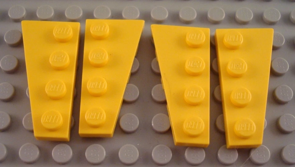 LEGO Lot of 2 Pair of Yellow 4x2 Wedge Wing Plates Parts and Pieces - Image 1 of 1