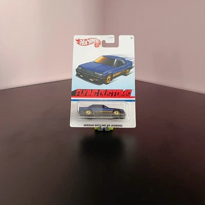Hot Wheels Flying Customs Nissan Skyline RS (KDR30) blu metallizzato – GJW94 – E - Immagine 1 di 3