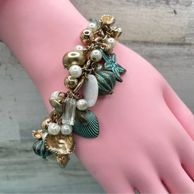 Hermoso Brazalete Náutico Sin Firmar Tono Dorado Concha Estrella de Mar Imitación Perla Dije Foto 1 de 4