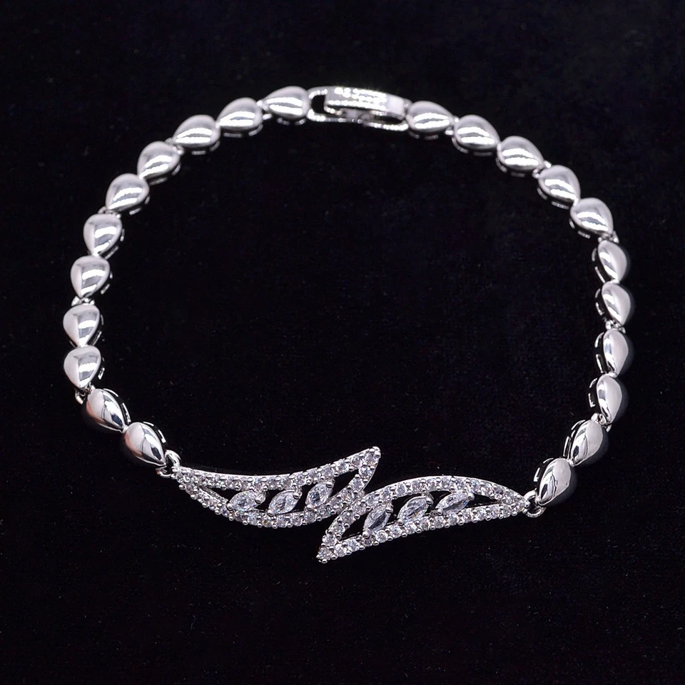 Brazalete con dije de hojas de topacio transparente de moda relleno de oro blanco de 18 quilates para mujer Foto 1 de 1