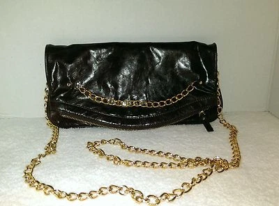 BOLSO DE NOCHE BANDOLERA PLEGABLE JOSEPH CHARLES CUERO BORGOÑA CADENA TONO DORADO Foto 1 de 4