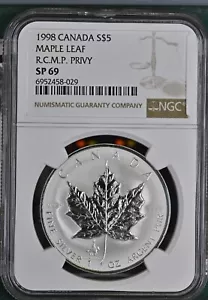 1998 Canada 5 Dollars Silver Maple Leaf RCMP Privy - NGC SP69 - Picture 1 of 2